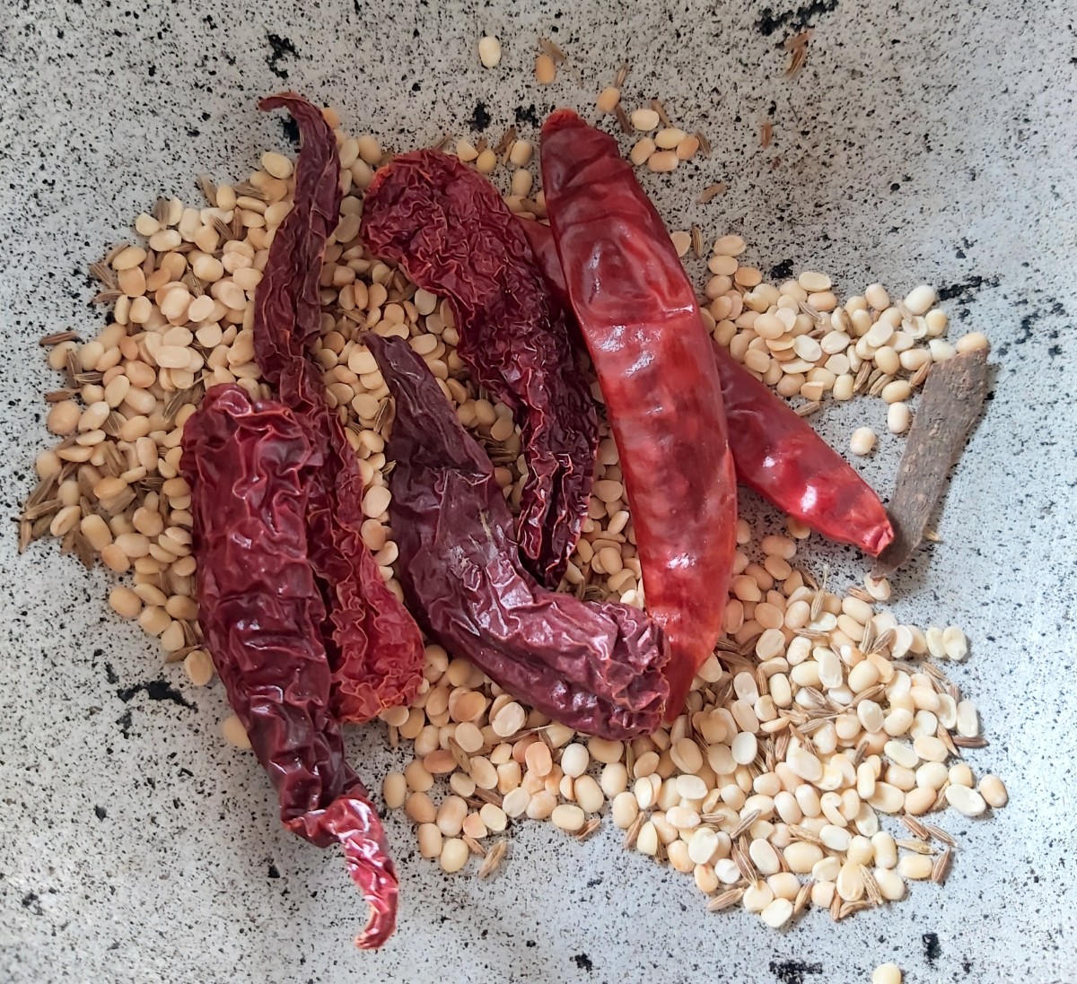 Add red chilies and fry till crisp. (I have used 1-2 guntur red chilies to give spiciness to the sambar and 4-5 byadagi red chilies to give nice color).