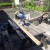 Using a mitre saw to cut the timber to lengths for making the front panel frame. 