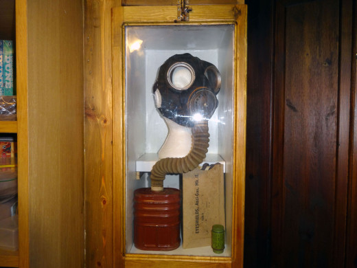 Other WWII artefacts also placed on display in the cabinet, including a pack of ‘Eye shields, Anti-Gas, Mk II’, and accompanying compound still in its green tube.