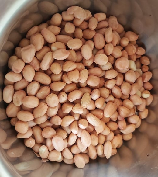 In a bowl or vessel take 1 cup of peanuts.