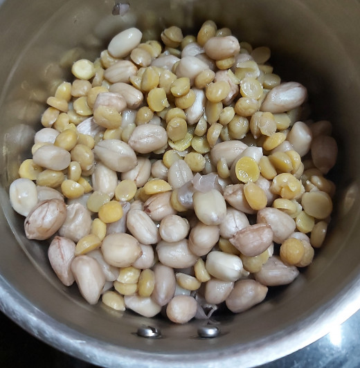 After pressure releases, open the cooker and drain the water completely from the cooked lentils using strainer (there should be no water remains in the lentils). Let it cool down and then transfer them into the mixer jar.