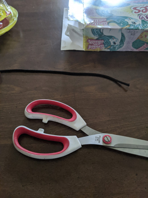 Cord and scissors