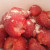 Sprinkle sugar on the fresh, sliced strawberries. Soak until juice appears. 