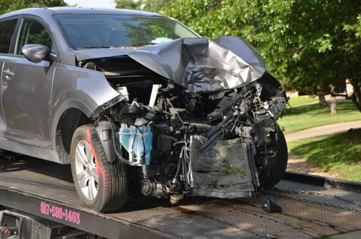 This picture obviously does not portray minor damage. You might need to file a claim if you sustained this kind of damage to your vehicle. 