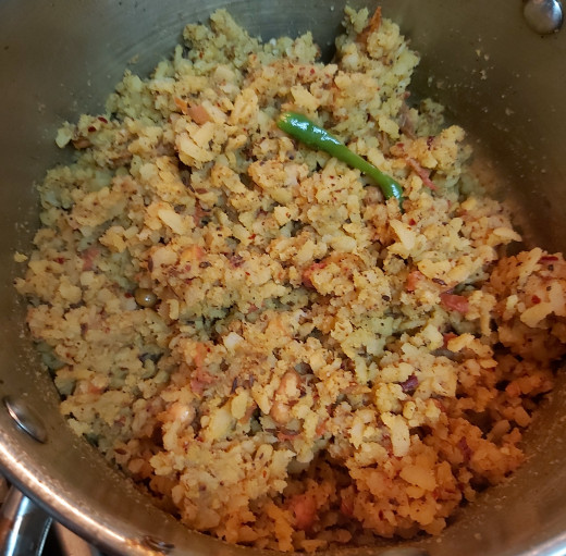 Keep stirring till all the flavors and spices are incorporated well with flattened rice. If you feel the dish is dry, sprinkle some drops of water and cook in low flame for 1-2  minutes.