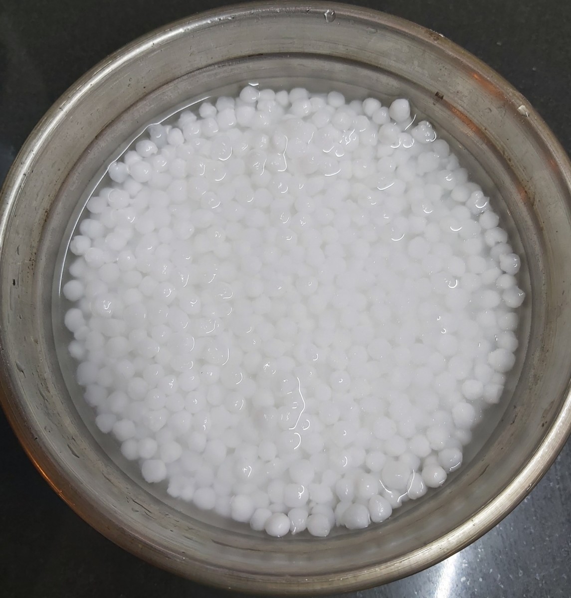After soaking time, you can see sabudana gets doubled in volume by absorbing water.