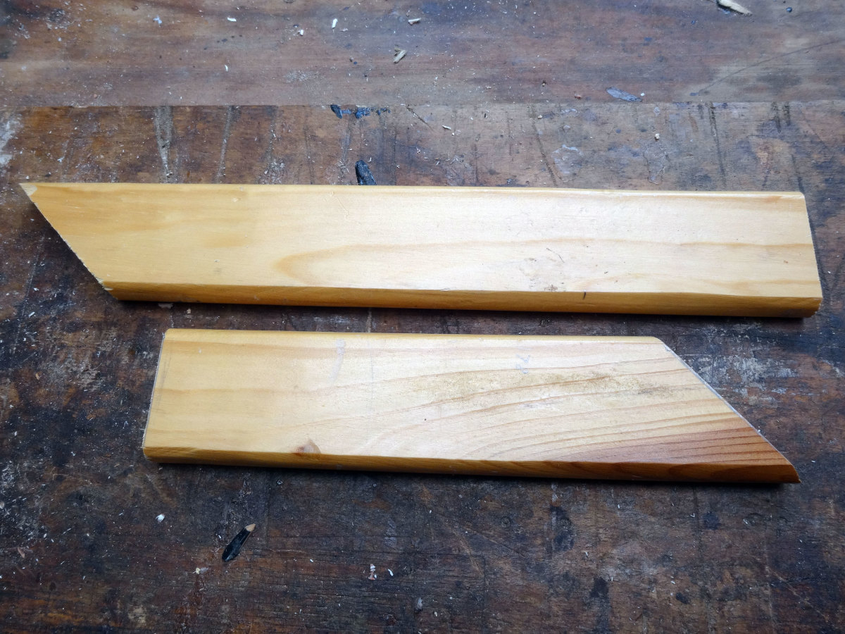 The two facings, wood recycled from a redundant shoe rack, cut to size and ready for gluing and screwing in place
