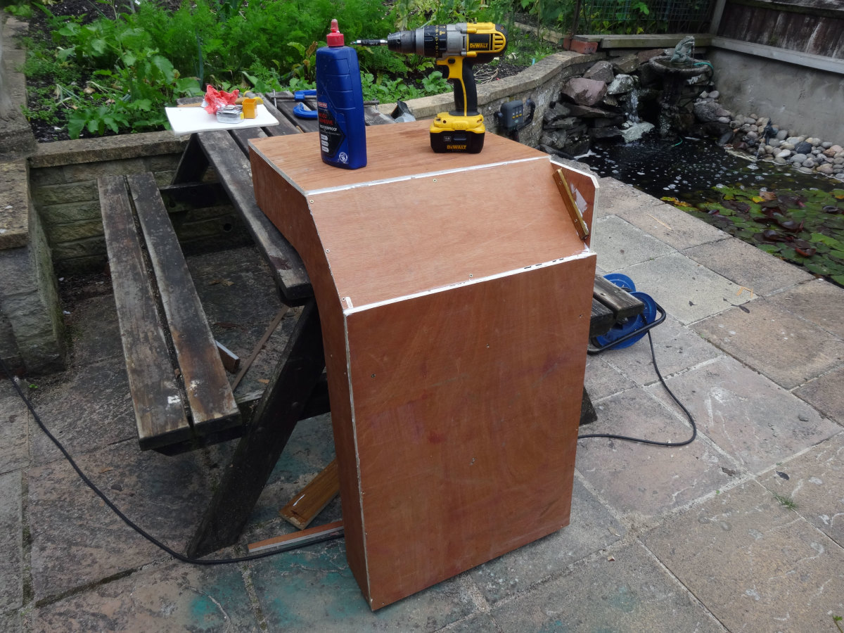 Gluing and screwing 12mm plywood to the two main backs, and 4mm plywood to the corner back