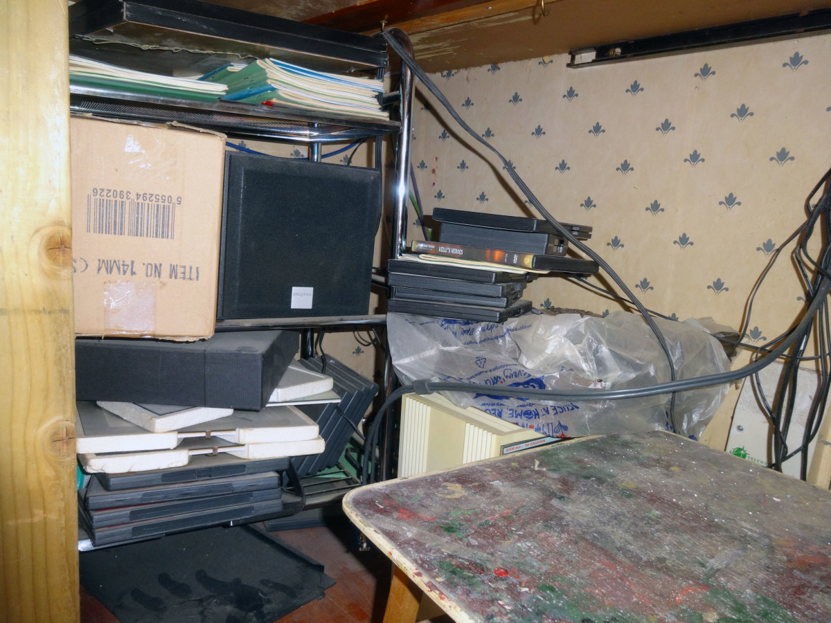In the corner, under the main desk, used as a dumping ground before the office makeover