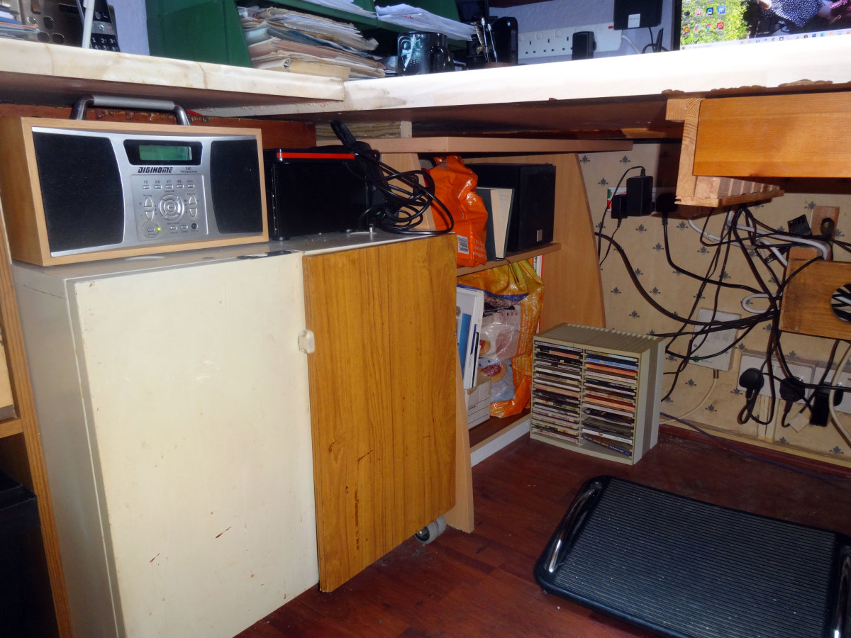 Old Ikea desk in its new location, making the storage under the main desk better organised