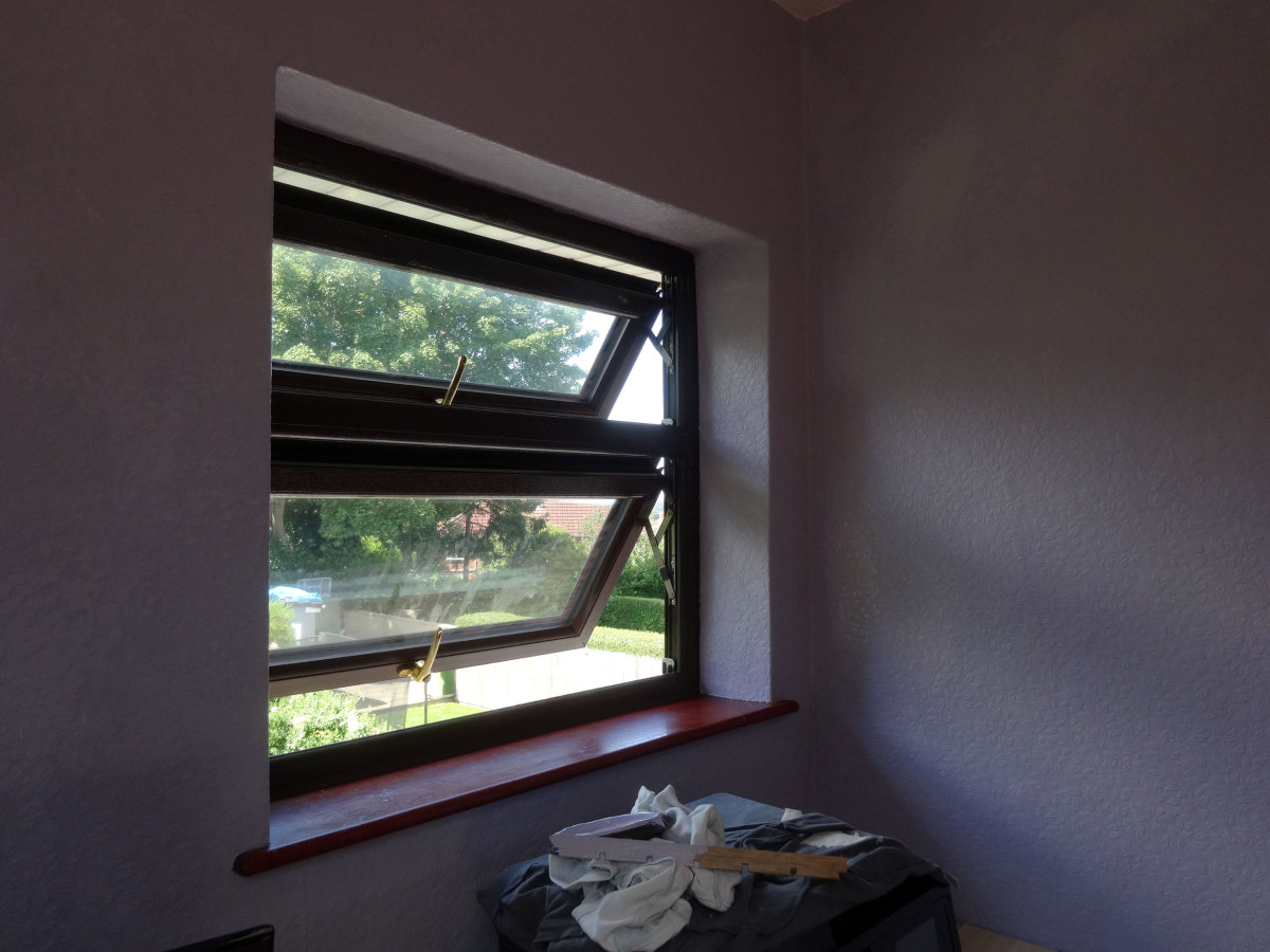 Just finished painting the wall with coloured emulsion around the office window
