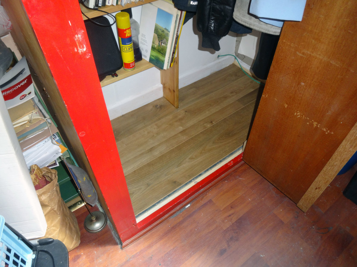 Spare laminated flooring laid in the wardrobe.
