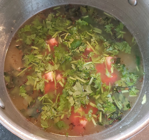 Add chopped tomatoes and coriander leaves.