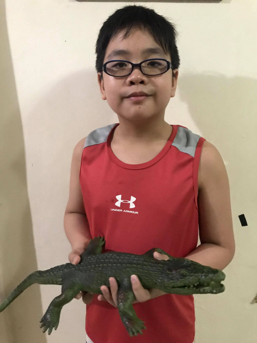 Leighton with his Alligator Toy