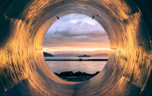 Sewage tube-hole at sunset