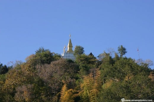 View of Wat Chom Si on the Summit of Mount Phousi Courtesy of asiaexplorers.com