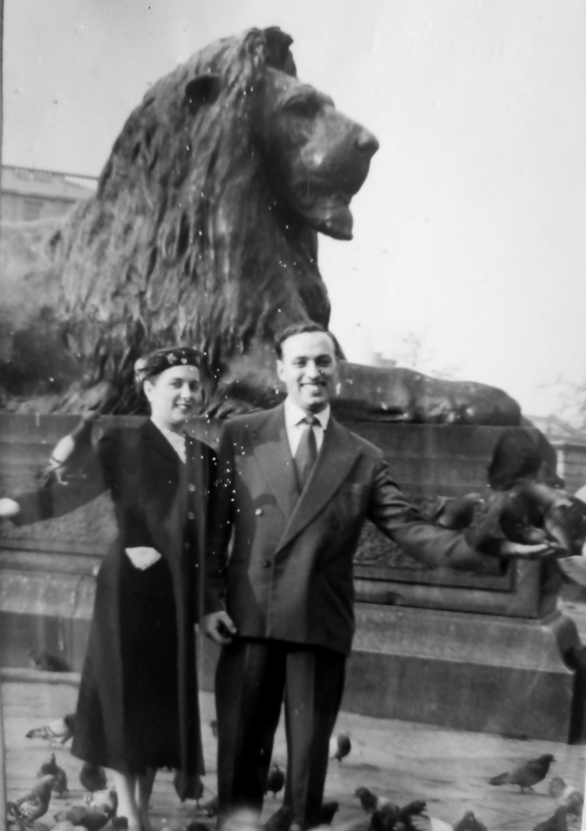 Mum and dad in Trafalgar Square - mum said later she was a bit nervous as there were hundreds of pigeons flying round their heads!