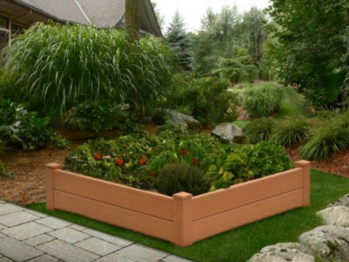 Wood planks, bricks, stones, even an old tub can be repurposed into a raised flower bed!