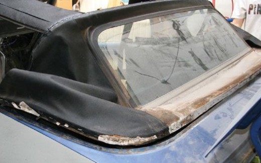 A good view of the rear window curtain. The main top has been rolled back.