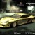 Golden Porche Cayman S frontal view.