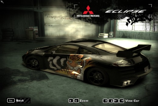 Black Mitsubishi Eclipse, parked, from back, racing car.