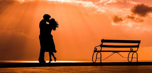 A couple  together in kissing mood.