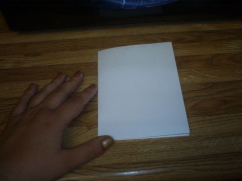 Now fold the half fold into a quarter fold card.