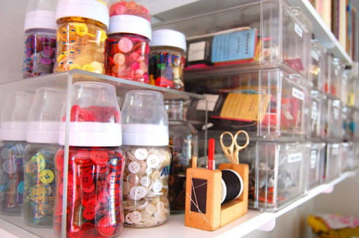 Clear containers are an easy choice for storing your buttons, Reuse medicine containers after you carefully wash them out.