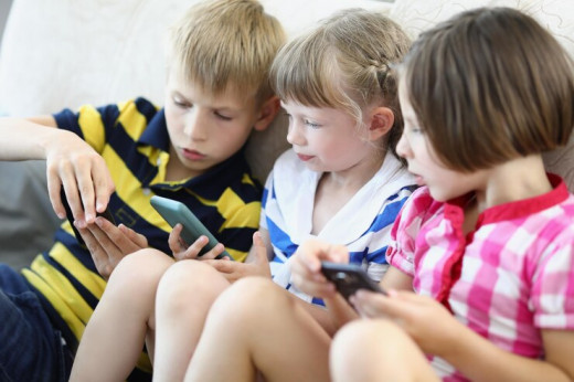 Children Playing Games on Phones