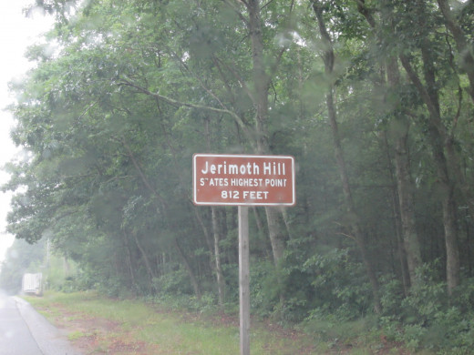 Roadside marker for Jerimoth Hill, RI along hwy 101. 