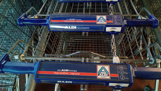 Apparently, I'm not the only person who thought this was unusual. There's a whole section dedicated to Aldi shopping cart photos on Wikimedia.