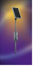 This is a somewhat dramatic presentation of a solar panel that powers a light fixture in a garage or closet.