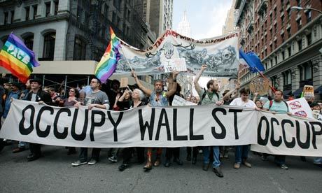 Occupy Wall Street protestors march down Fifth Avenue towards Union Square during a May Day rally in New York City
