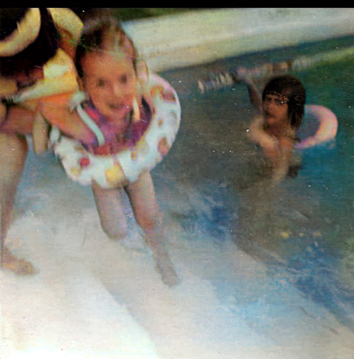 Me in the swimming pool at Butlins Pwllheli on a family holiday, when mum was trying to teach me to swim