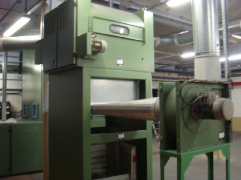 A part of Blow Room line that converts cotton to sheet form called Laps,which are fed to next machine in sheet form rolled in to fixed weight and length as also width.