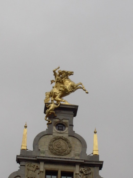 Small Gilded Statue High Above Antwerp