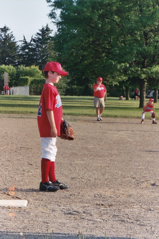 At 3 learning to play T-ball