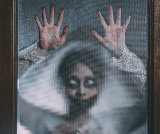 Ghostly image on door | Image source: Canva