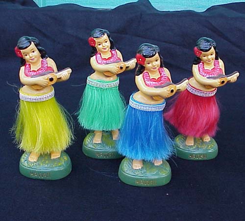 Stereotypical hula girls with ukuleles