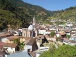 Angangueo, Michoacan.  Monarch Sanctuary begins on slopes above town.  Hotels here. Pretty place. 