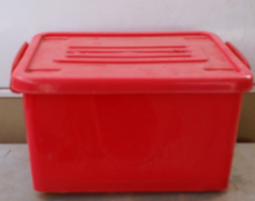 Select a medium size container similar to this and cut a hole in the top