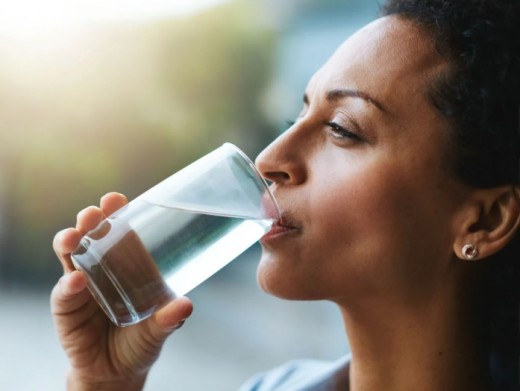 Woman Drinking a Glass of Water