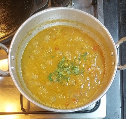 Once well cooked, add 1/4 cup chopped coriander leaves, give a mix. Switch off the flame.