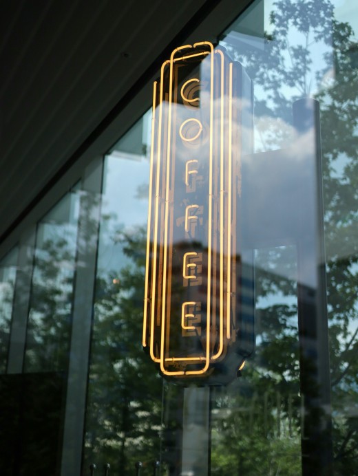 A neon coffee sign, photo by LEE JIWOO on Unsplash