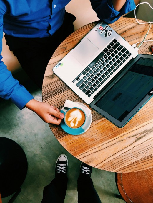 Laptop and coffee, photo by Hidayat Abisena on Unsplash