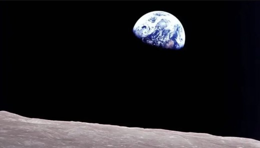The famous Earthrise photograph shows a curved Earth. However, it does not show the earth as a complete sphere or as an oblate spheroid. The photograph was taken during the Apollo 8 mission on December 24, 1968, by astronaut William Anders.