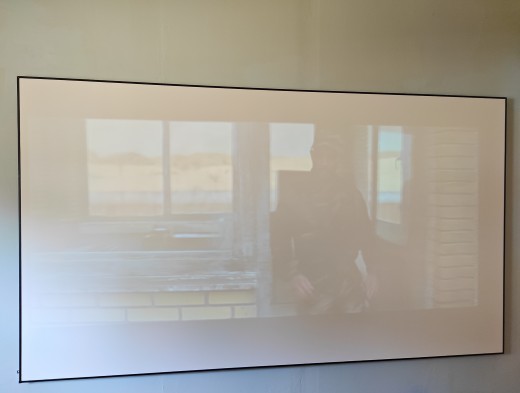 Playing a movie with the blackout curtains open, allowing in the sunlight