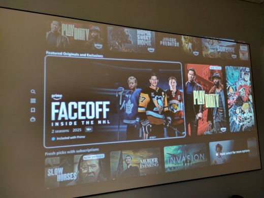 Playing a movie at night with lighting in the background