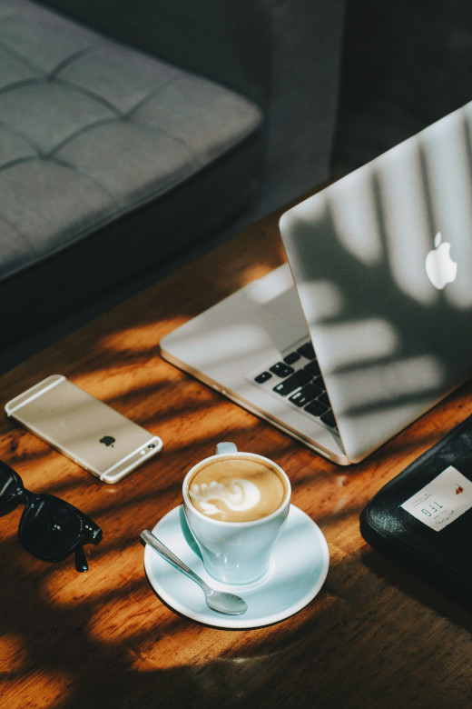 Cappuccino in white ceramic cup with saucer beside gold iphone and laptop, photo by Roman Bintang on Unsplash Cappuccino in white ceramic cup with saucer beside gold iphone and laptop, photo by Roman Bintang on Unsplash