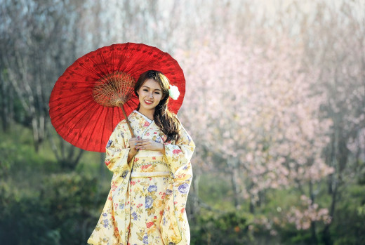 Japanese women exemplify refined beauty. The elegant posture of the kimono, complemented by the traditional wagasa (umbrella), embodies the principles of Iki—a subtle, sophisticated aesthetic that defines Japanese style. Japanese women exemplify refined beauty. The elegant posture of the kimono, complemented by the traditional wagasa (umbrella), embodies the principles of Iki—a subtle, sophisticated aesthetic that defines Japanese style.